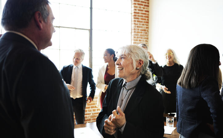 Olders in conversation at conference
