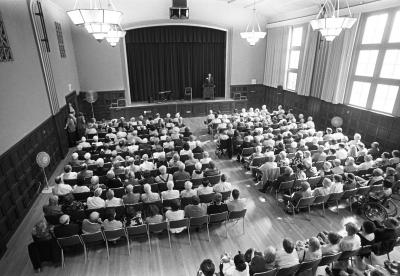 A full house of retirees at an early LIR program - black and white photo